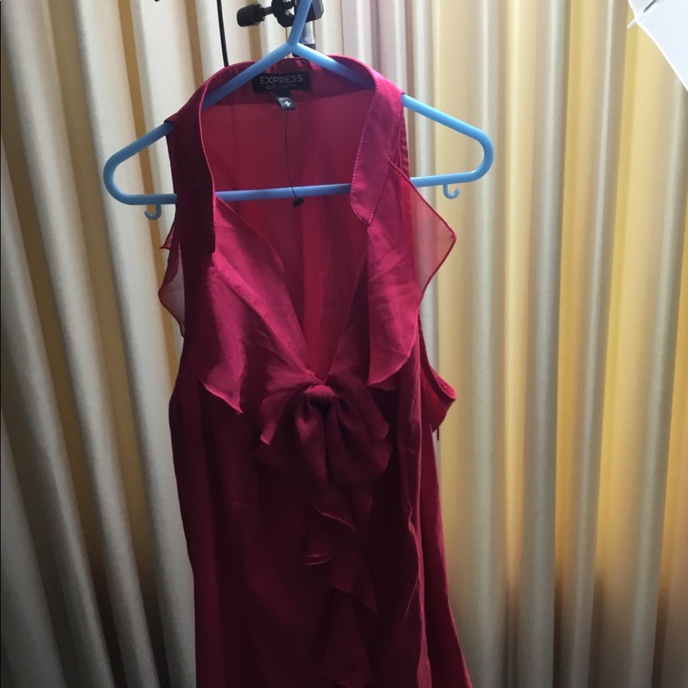 This cute red blouse can be worn for any occasion.